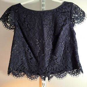 WHBM -NWOT black, lace, crop length top. Size 4